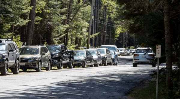 Cars parked on Adirondack Loj Road