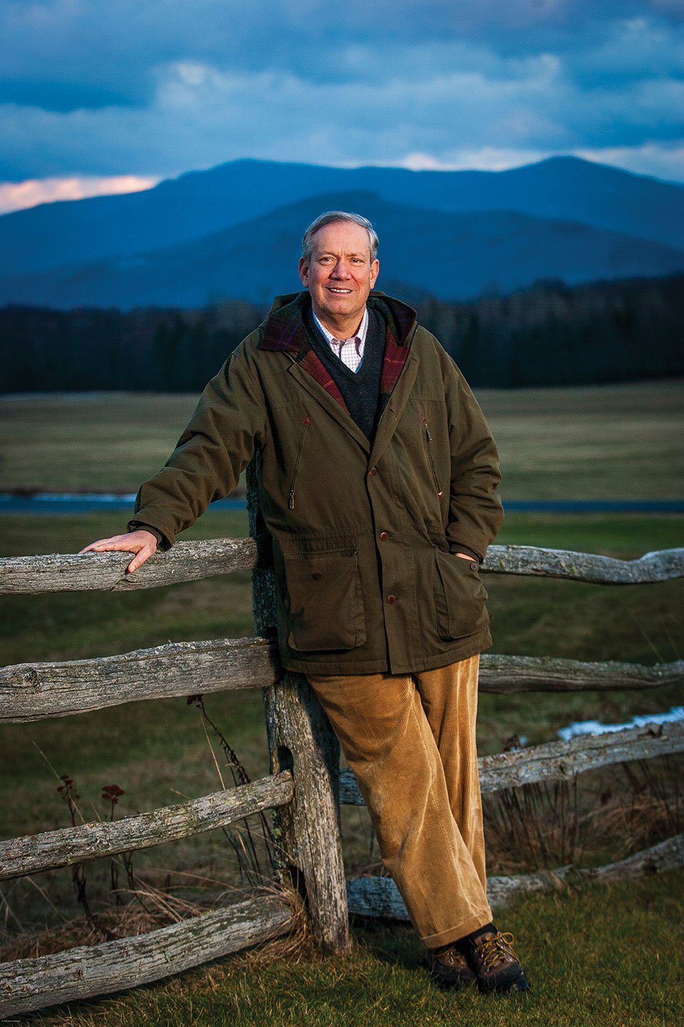 George E. Pataki in Lake Placid with mountains in the background